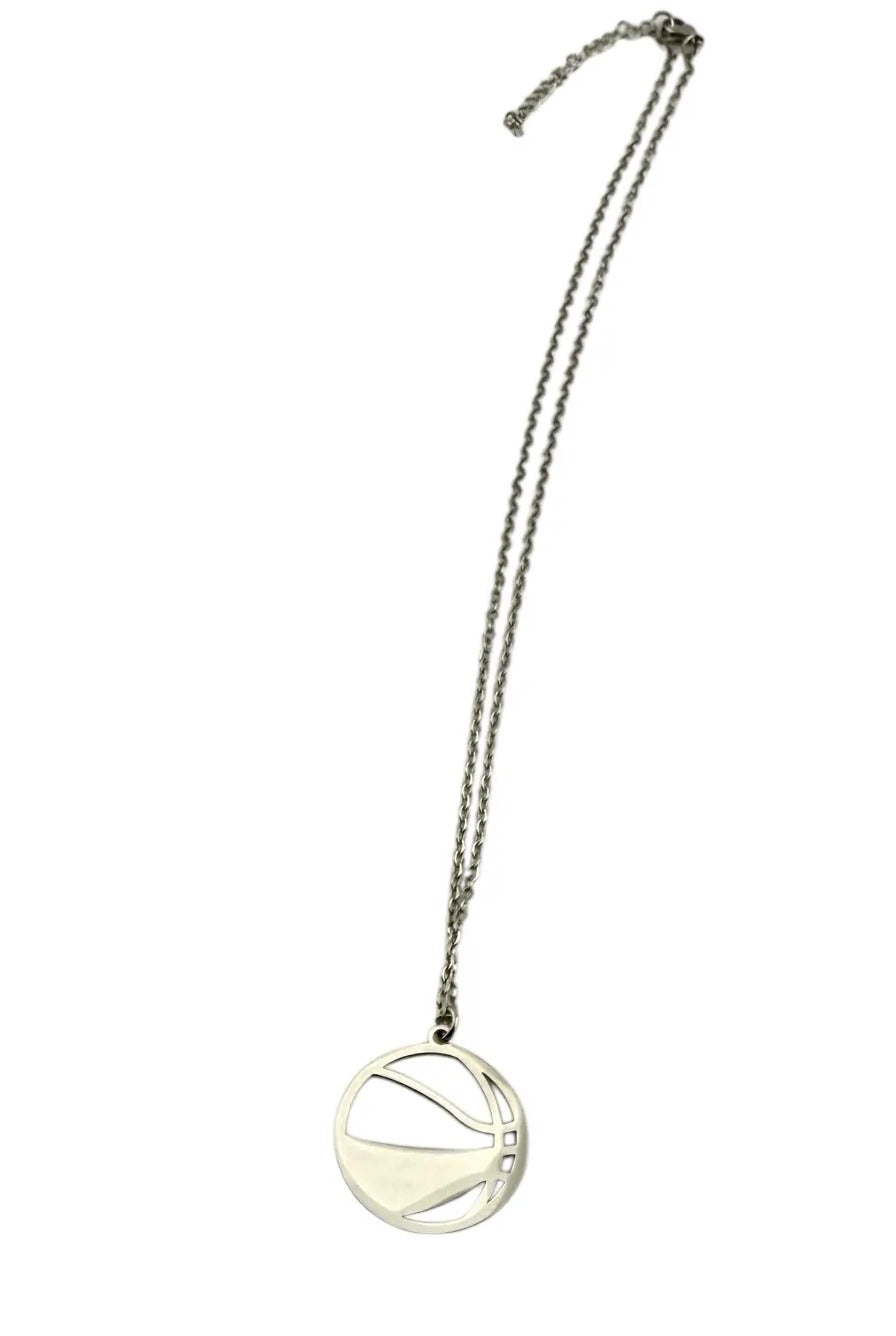 A silver necklace with a round pendant featuring a basketball design.