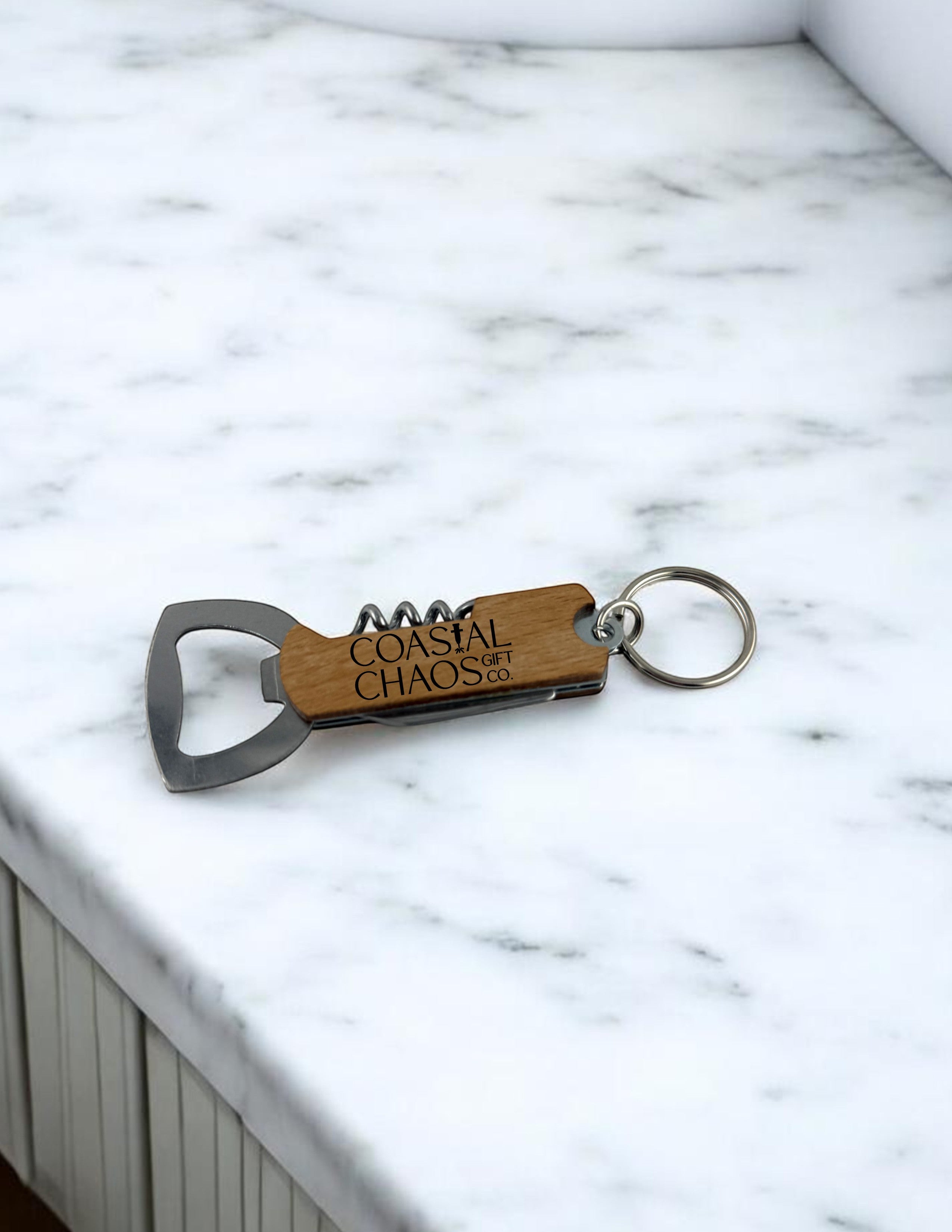 Coastal Chaos Co. wood and metal multi-tool keychain with corkscrew and bottle opener, custom engraved.