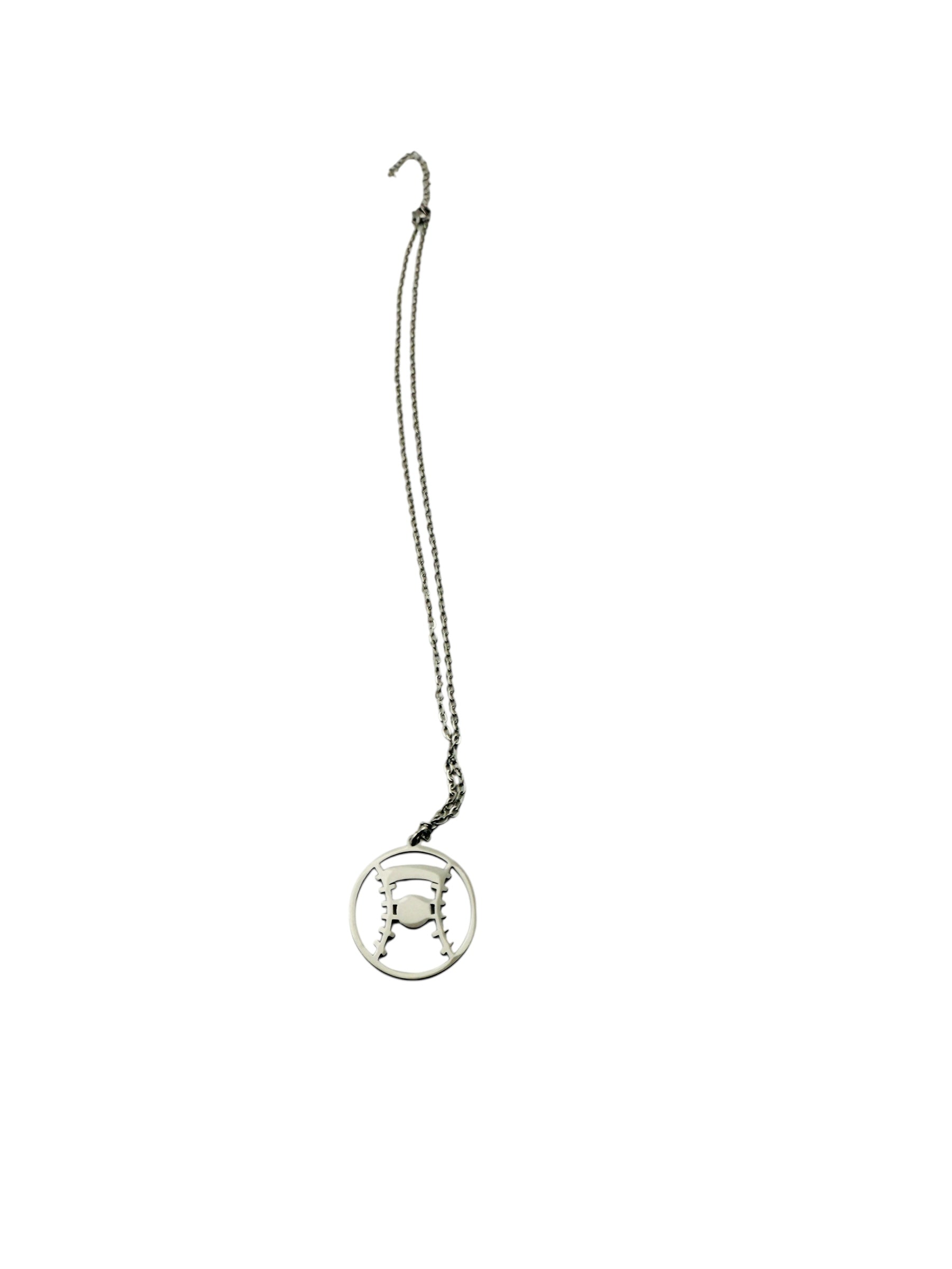 A silver necklace with a pendant featuring a baseball design.
